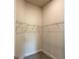 This walk-in closet provides ample shelving for convenient and organized storage at 4278 Sagefield Dr, St Cloud, FL 34773