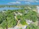 Property boundary in overhead view, set amongst trees, near roadways and a tranquil lake at 430 S Dollins Ave, Orlando, FL 32805