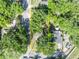 Aerial view of a property highlighting lot lines, mature trees, and neighborhood at 430 S Dollins Ave, Orlando, FL 32805