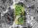 Aerial view of a property highlighting lot lines, mature trees, and neighborhood at 430 S Dollins Ave, Orlando, FL 32805
