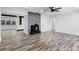 Spacious living room featuring hardwood floors, fireplace, and an open floor plan at 505 Lake Shore Dr, Maitland, FL 32751