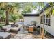 Outdoor patio with a seating area and a grill, perfect for entertaining at 505 Lake Shore Dr, Maitland, FL 32751