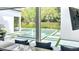 The beautiful backyard pool is viewed from the outdoor bar area at 532 Worthington Dr, Winter Park, FL 32789