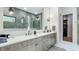 Elegant bathroom with dual vanities and modern fixtures, ample storage at 532 Worthington Dr, Winter Park, FL 32789