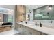 Well-lit bathroom with double sinks, adjacent to a serene bedroom space at 532 Worthington Dr, Winter Park, FL 32789