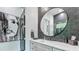 Chic bathroom vanity with modern mirror and stylish tiled shower view at 532 Worthington Dr, Winter Park, FL 32789