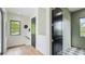 This hallway leads to a room with checkered floors at 532 Worthington Dr, Winter Park, FL 32789