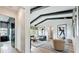 Cozy living room features wood floors, exposed beams, comfortable seating, and stylish decor at 532 Worthington Dr, Winter Park, FL 32789