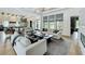 Open-concept living room connected to the kitchen with high end design, hardwood floors, and modern furniture at 532 Worthington Dr, Winter Park, FL 32789