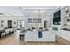 Bright living room with coffered ceiling, modern fireplace, and designer furniture at 532 Worthington Dr, Winter Park, FL 32789