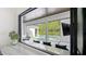 Outdoor bar features a view of the outdoor dining area and backyard pool at 532 Worthington Dr, Winter Park, FL 32789