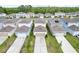 Aerial view of a residential neighborhood showcasing well-maintained homes and landscaping at 5826 Wooden Pine Dr, Orlando, FL 32829