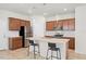 Modern kitchen featuring an island and stainless-steel appliances at 5826 Wooden Pine Dr, Orlando, FL 32829