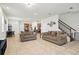 Bright living room with tile flooring and an open-concept design at 5826 Wooden Pine Dr, Orlando, FL 32829