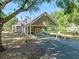 Covered carport with ample parking space and a well-maintained driveway at 6037 Lake Erie Rd, Groveland, FL 34736