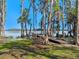 Picturesque dock on the water with gazebo and scenic views at 6037 Lake Erie Rd, Groveland, FL 34736