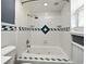 Bathroom features a tiled shower and jacuzzi tub at 607 Brittany Ct, Casselberry, FL 32707