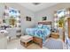 Bedroom with bright windows, neutral walls, and light wood bedframe at 6816 Greengrove Blvd, Clermont, FL 34714