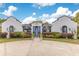 Charming home with striking curb appeal, featuring a well-maintained lawn and unique architectural details at 6816 Greengrove Blvd, Clermont, FL 34714