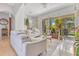 Spacious living room with large sliding glass doors leading to the outdoor patio at 6816 Greengrove Blvd, Clermont, FL 34714