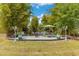 Inviting patio with comfortable seating, perfect for outdoor gatherings and enjoying the tranquil surroundings at 6816 Greengrove Blvd, Clermont, FL 34714