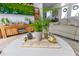 Comfortable sitting room with natural light, stylish decor, and cozy furniture at 6816 Greengrove Blvd, Clermont, FL 34714