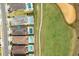 An aerial view of a home with a private pool and a beautiful golf course view at 7928 Jacks Club Dr, Kissimmee, FL 34747