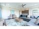 Open-concept living room features comfortable seating, wet bar, and stylish decor at 7928 Jacks Club Dr, Kissimmee, FL 34747