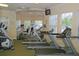 Well-equipped fitness center with treadmills and weight machines at 8107 Coconut Palm Way # 102, Kissimmee, FL 34747