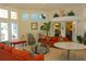 Community lobby with couches, tables and chairs at 8107 Coconut Palm Way # 102, Kissimmee, FL 34747
