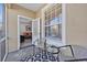 Enclosed patio with outdoor seating offering interior access at 8107 Coconut Palm Way # 102, Kissimmee, FL 34747