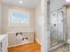 Bathroom with stone floors and glass shower at 811 Laurel Ave, Orlando, FL 32803