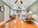 Bright living room with wood floors, fireplace, built-in bookshelves, and a comfortable sofa at 811 Laurel Ave, Orlando, FL 32803
