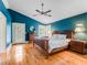 Stylish main bedroom features a vaulted ceiling, hardwood floors, and natural light at 811 Laurel Ave, Orlando, FL 32803