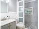 Bathroom featuring new fixtures, decorative tile floor and standing shower at 844 Rosalia Dr, Sanford, FL 32771