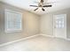 Bedroom with tile flooring, a window with blinds, and a back door at 844 Rosalia Dr, Sanford, FL 32771