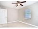 A bedroom featuring tile floors, a ceiling fan, natural light, and neutral paint at 844 Rosalia Dr, Sanford, FL 32771