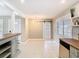 Bright dining area with modern light fixture and decorative barn door at 844 Rosalia Dr, Sanford, FL 32771