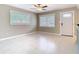 Open living space with ceramic tile floors and natural light streaming through large windows at 844 Rosalia Dr, Sanford, FL 32771