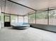 Spacious covered patio with hot tub, screened enclosure, and ample room for seating at 844 Rosalia Dr, Sanford, FL 32771