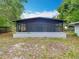 Cozy screened-in porch offers a relaxing outdoor living space with ample room for entertaining and enjoying the fresh air at 844 Rosalia Dr, Sanford, FL 32771