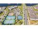 Aerial view of community amenities including pool, tennis courts, and lush landscaping near a lake at 10209 Folly Beach Rd, Orlando, FL 32827