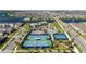 Aerial view of the community, featuring tennis courts, a basketball court, and a playground at 10209 Folly Beach Rd, Orlando, FL 32827