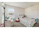 Bedroom with neutral carpet, natural light and a white desk at 10209 Folly Beach Rd, Orlando, FL 32827