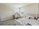 Bedroom with neutral carpet, natural light and a desk at 10209 Folly Beach Rd, Orlando, FL 32827