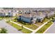 Charming two-story home with a well-maintained lawn and landscaping in a Gathering-friendly neighborhood at 10209 Folly Beach Rd, Orlando, FL 32827