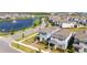 Beautiful two-story home with manicured lawn in a desirable community near a lake with fountain at 10209 Folly Beach Rd, Orlando, FL 32827