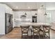 Stylish kitchen features white cabinets, a large island, and stainless steel appliances at 10209 Folly Beach Rd, Orlando, FL 32827