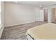 Primary bedroom with bright natural light, neutral carpet and multiple closets at 10209 Folly Beach Rd, Orlando, FL 32827