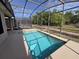 A screened in in-ground pool featuring sunny patio and landscaping at 110 Sophia Marie Cv, Sanford, FL 32771